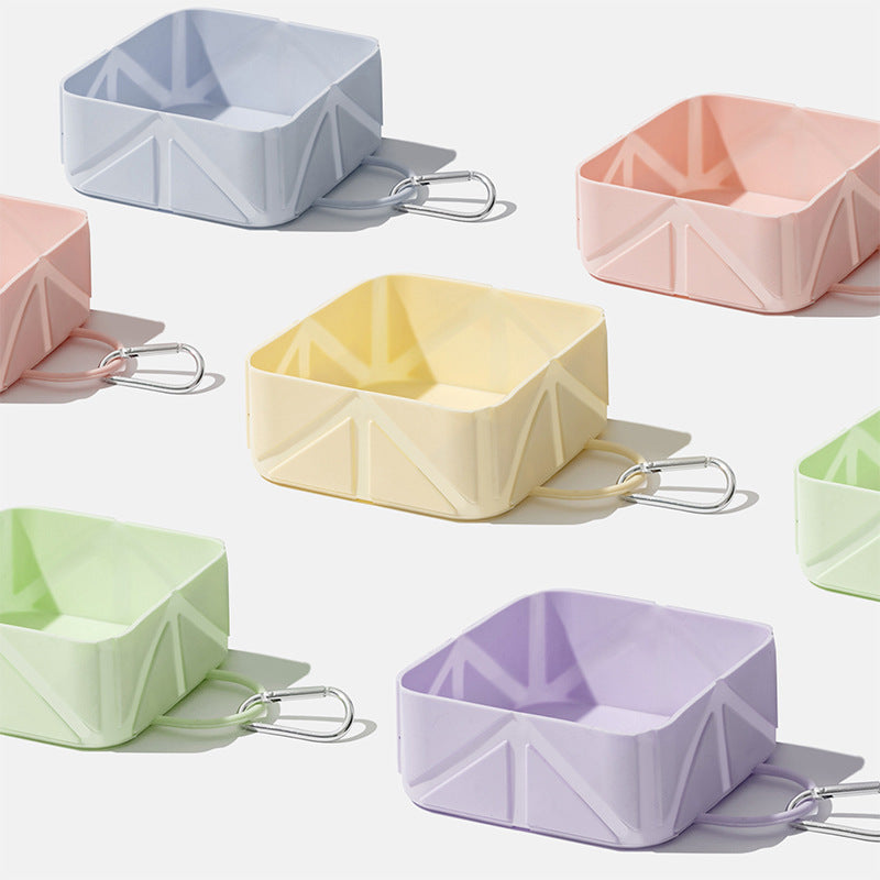 Set of colorful geometric silicone bowls on a white background
