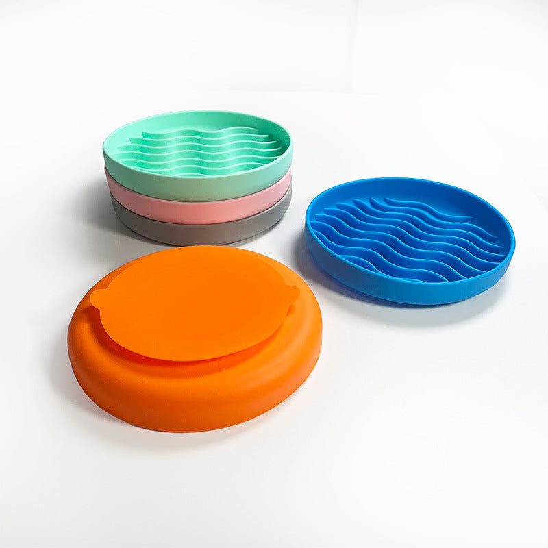 Set of colorful silicone mats on a white background